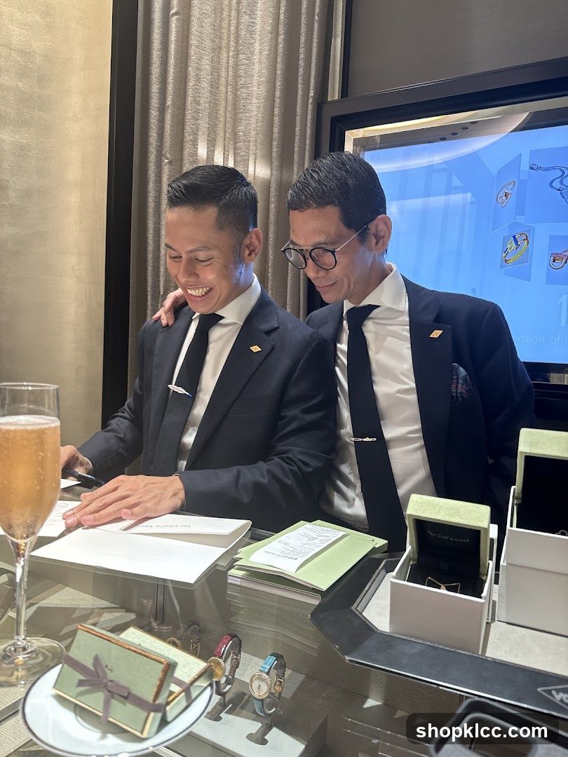Two men in suits looking at documents