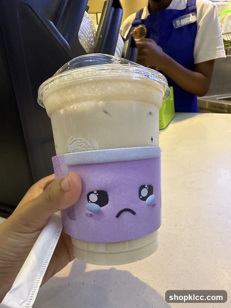 Beverage with Sad Face Sleeve