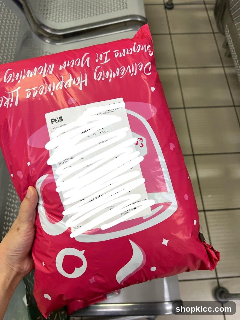 Pink delivery package with obscured label
