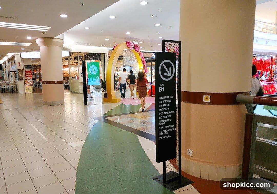 Shopping Mall Interior with Signage and Decorative Archway
