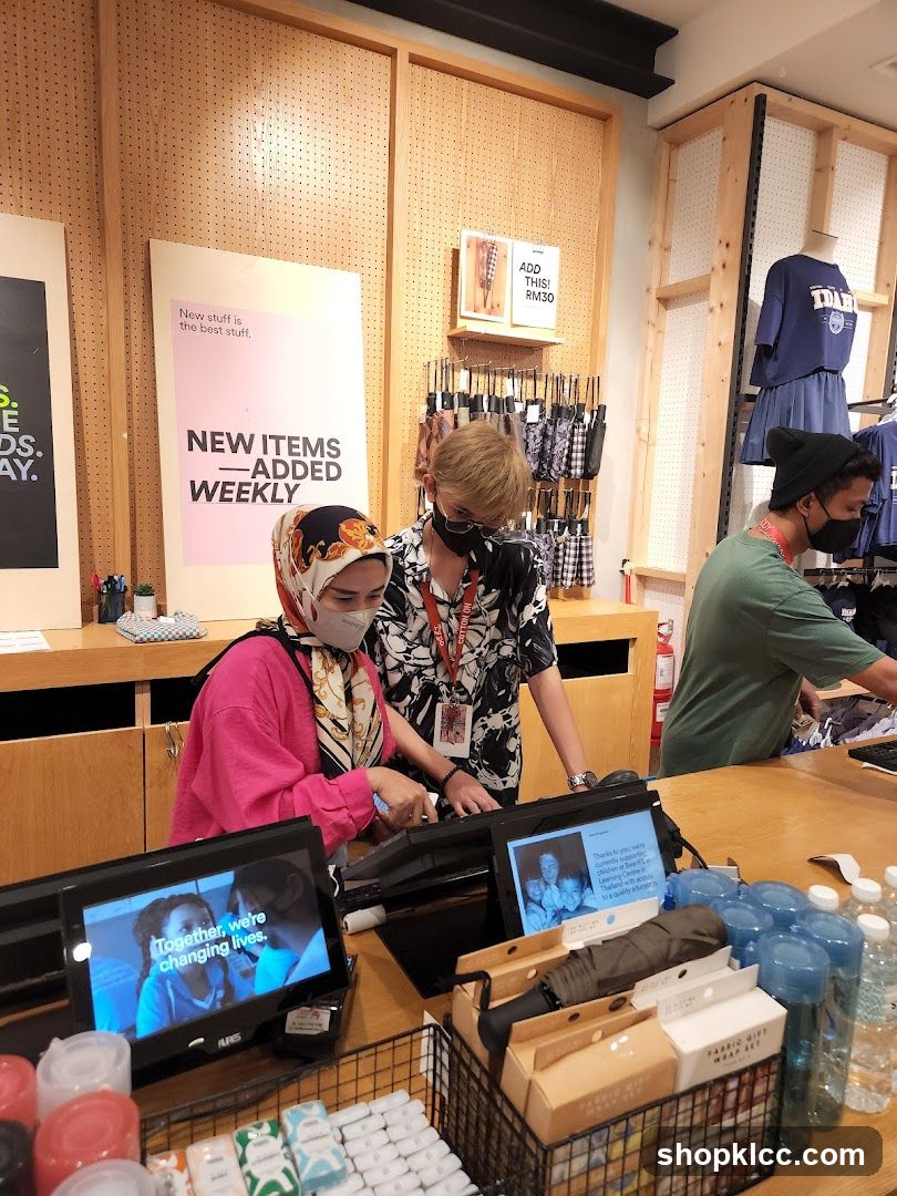 Store Interior with Staff and Customers