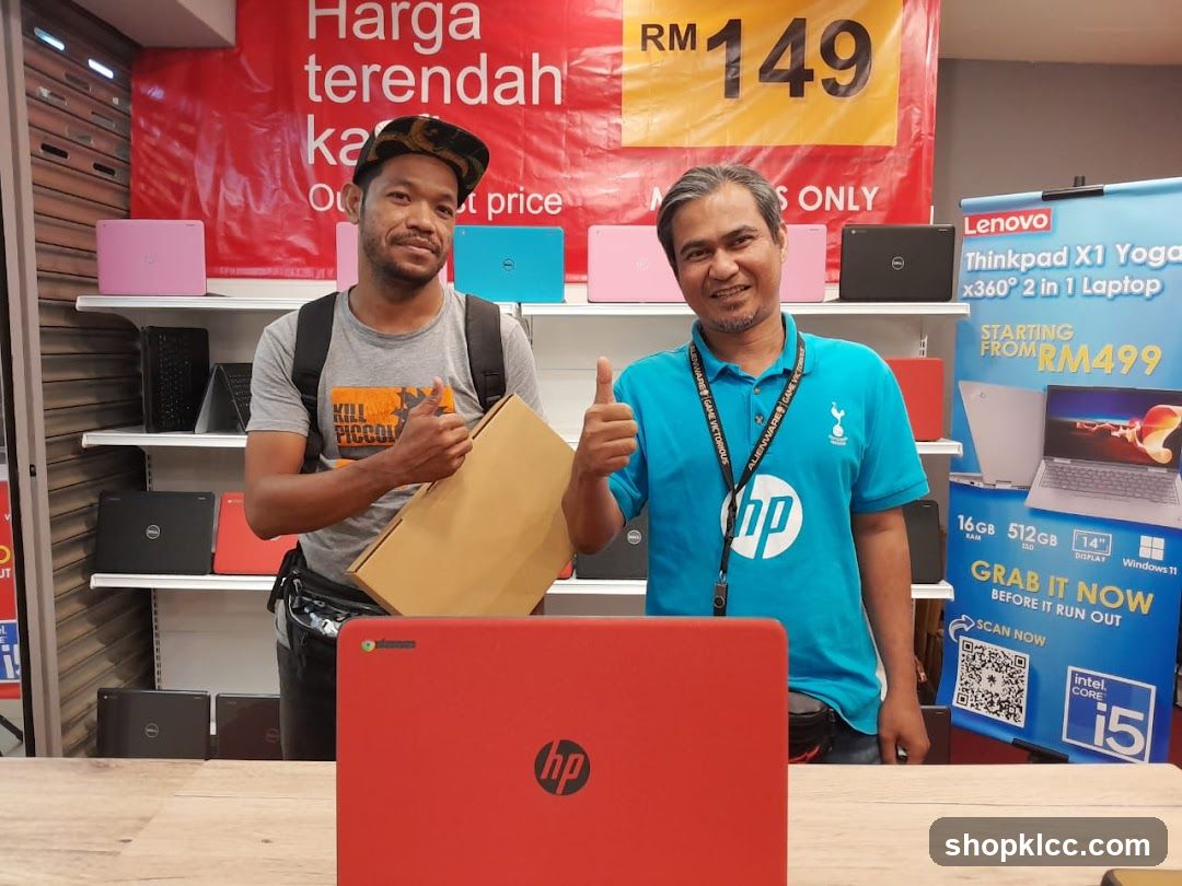 Laptop Store Interior with Staff and Products