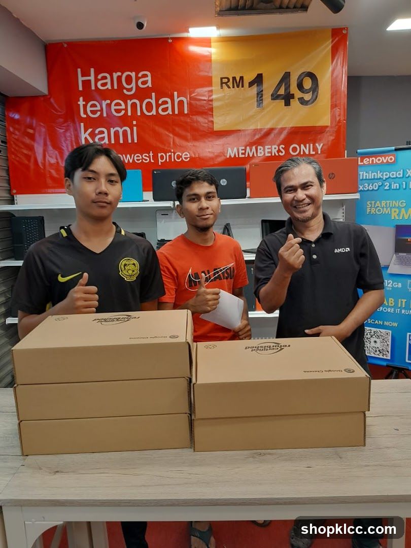 Laptop Store Interior with Staff and Products