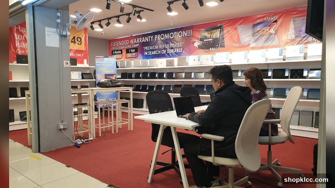 Electronics Store Interior with Extended Warranty Promotion