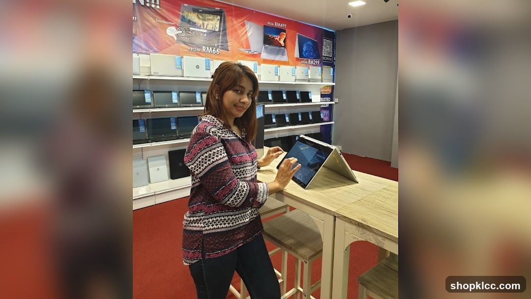 Woman in Electronics Store