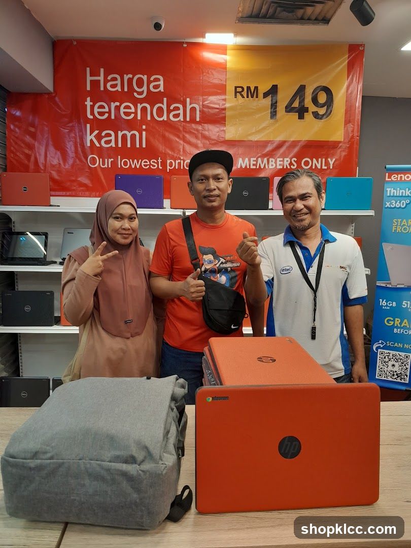 Laptop Store Interior with Staff and Customers
