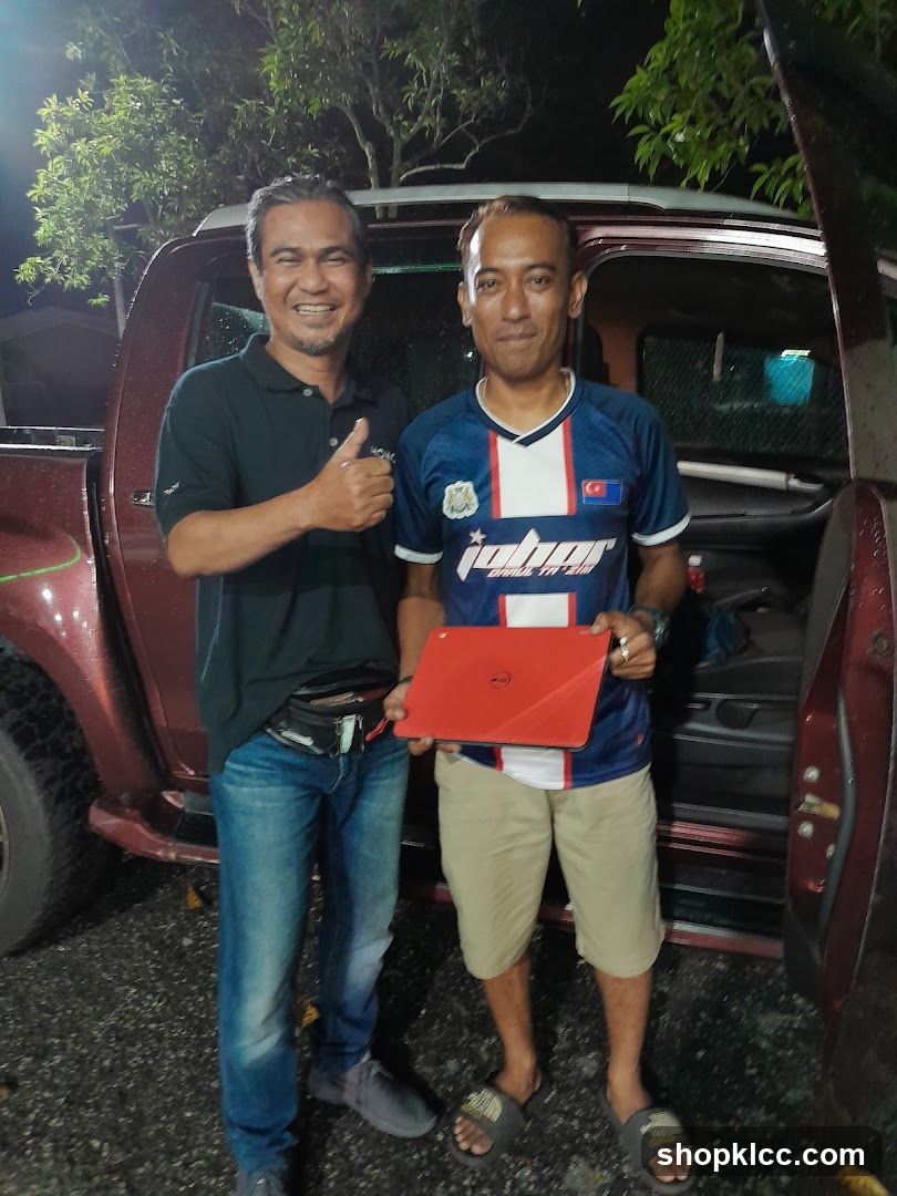 Men with Laptop and Car