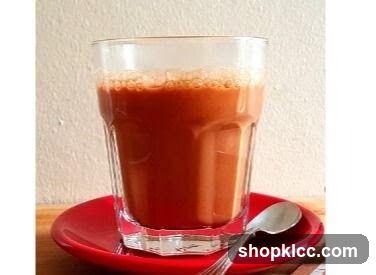 Glass of Red Drink on Saucer