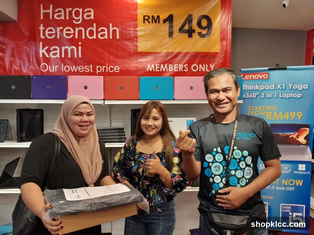 Laptop Store Interior with Staff and Products