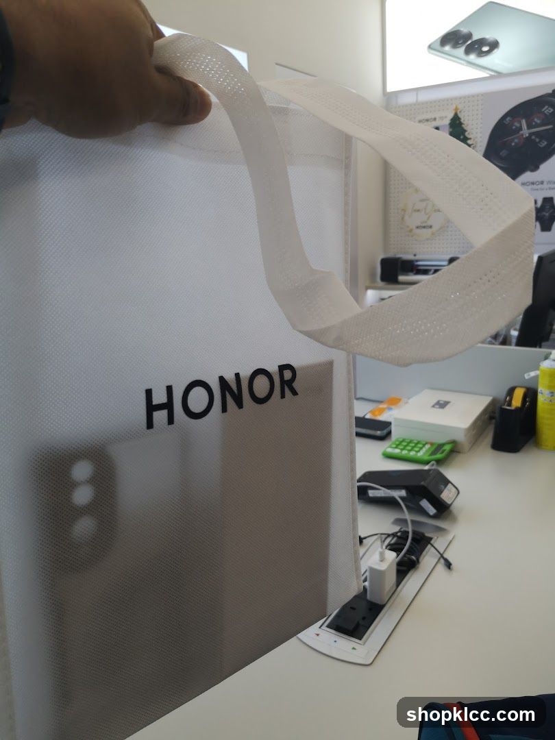 Honor branded bag with phone