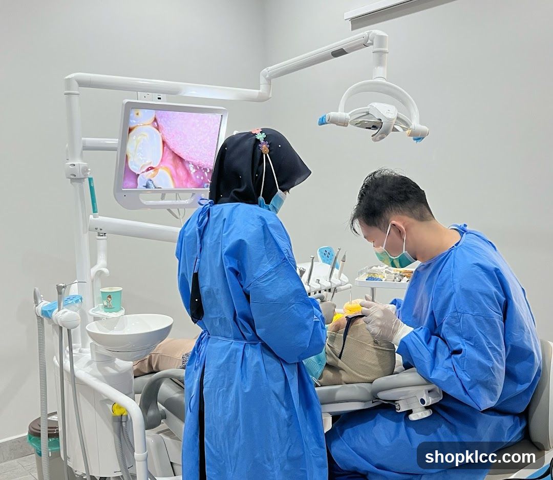 Dentist and assistant performing a dental procedure