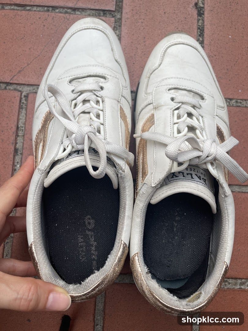 White Sneakers with Gold Accents