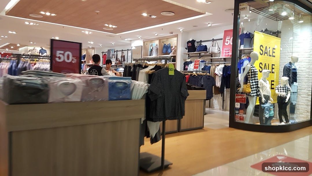 Clothing Store Interior with Sale Signs