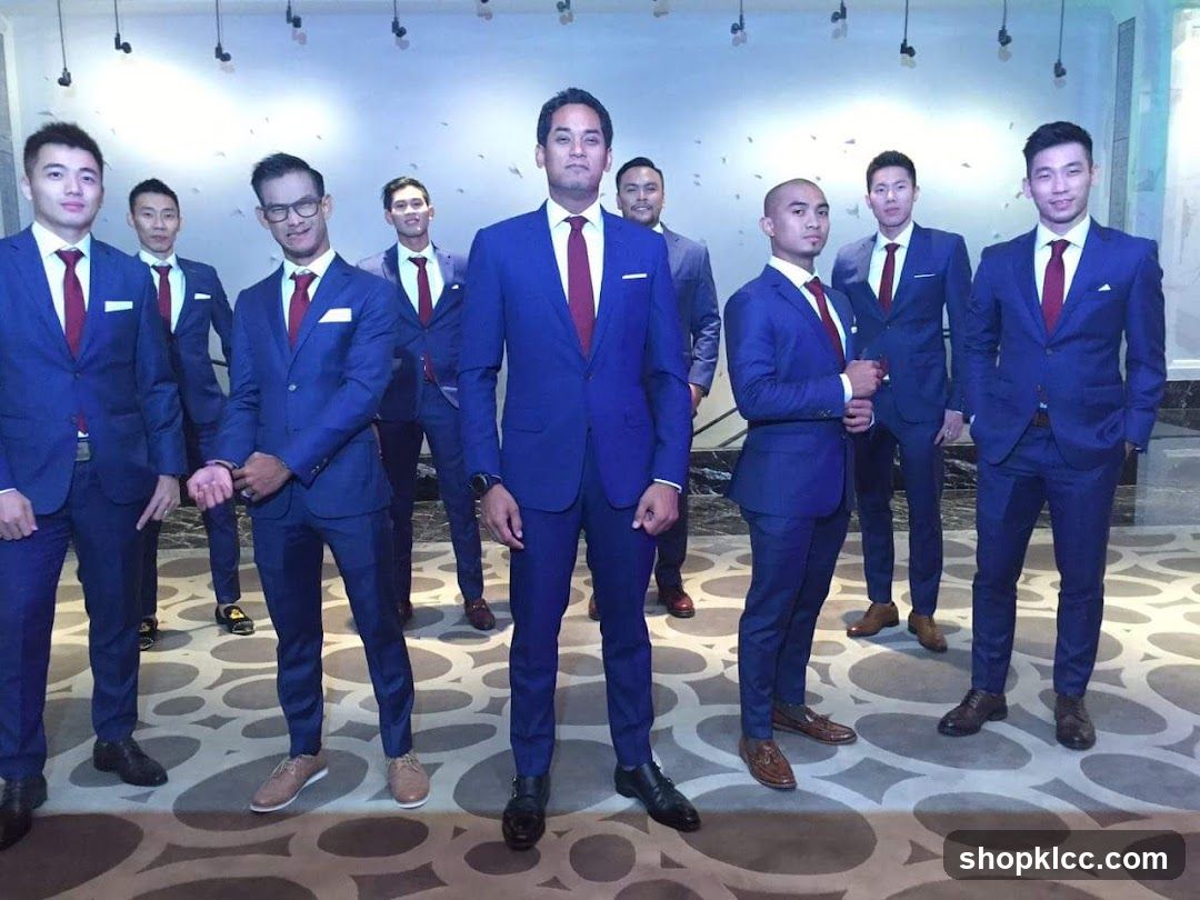 Groomsmen in matching blue suits
