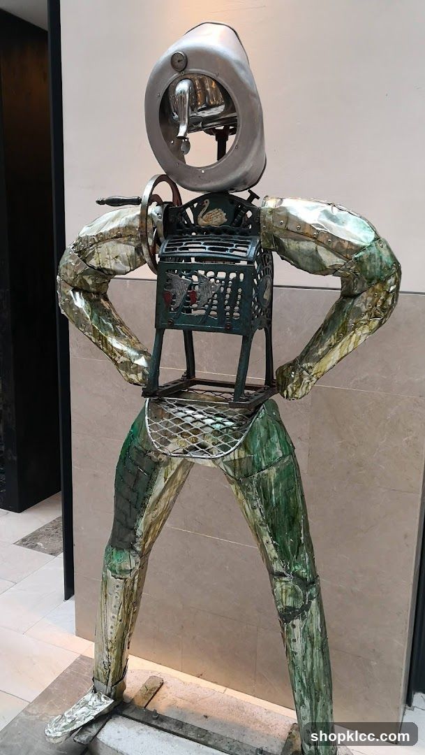 Metal Sculpture with Shopping Basket