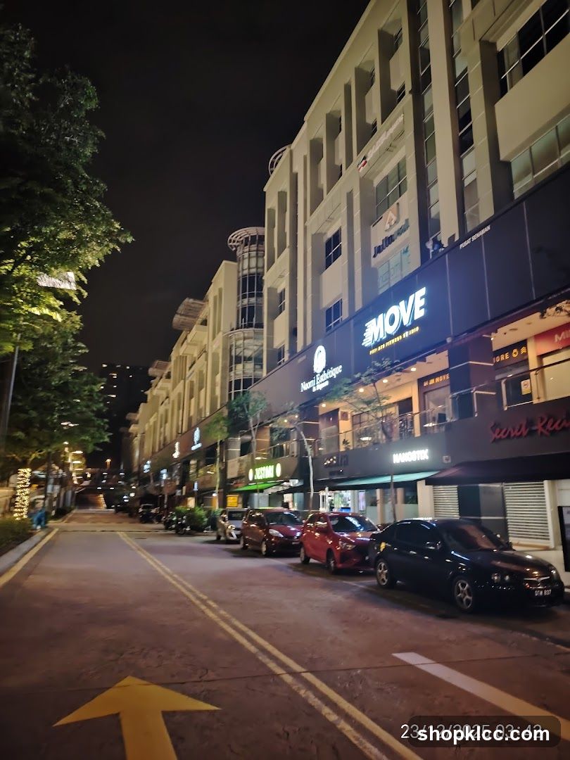 Night street scene with shops