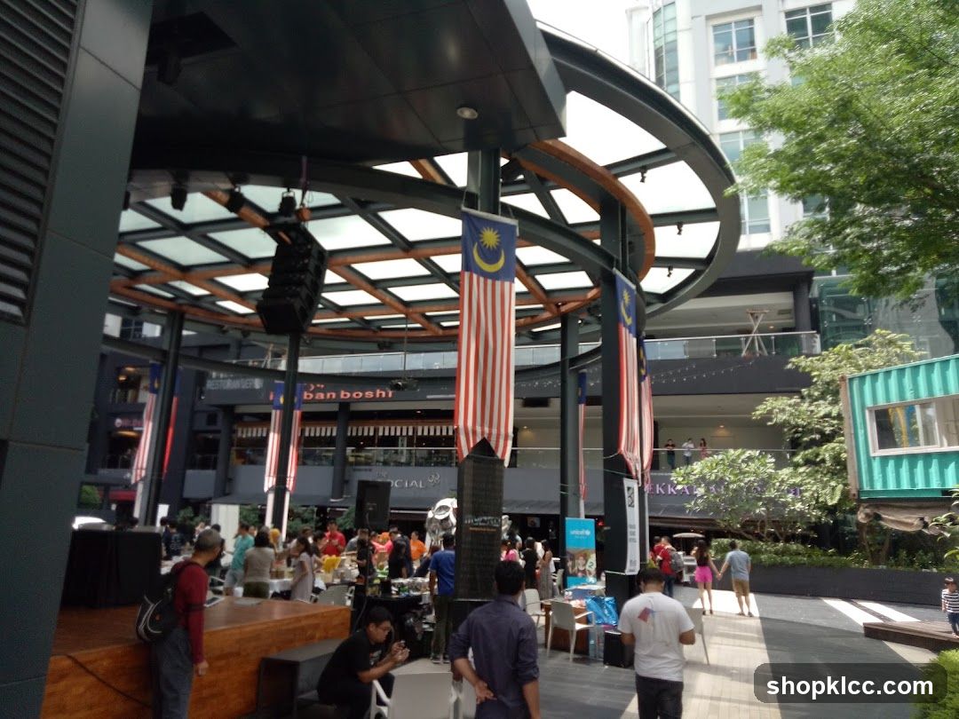Outdoor Market Scene with Malaysian Flags