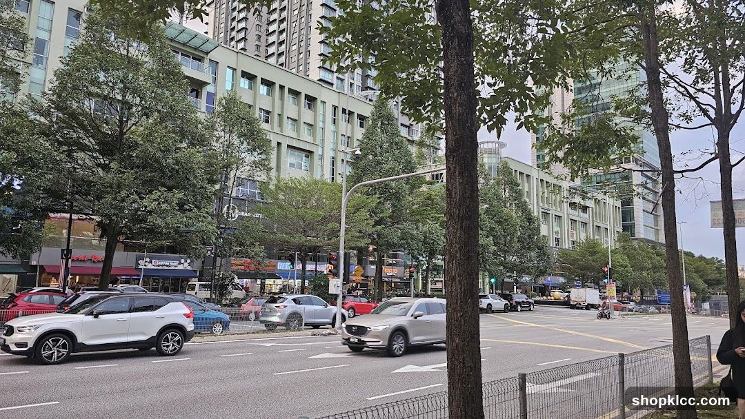 Urban Street Scene with Vehicles and Buildings