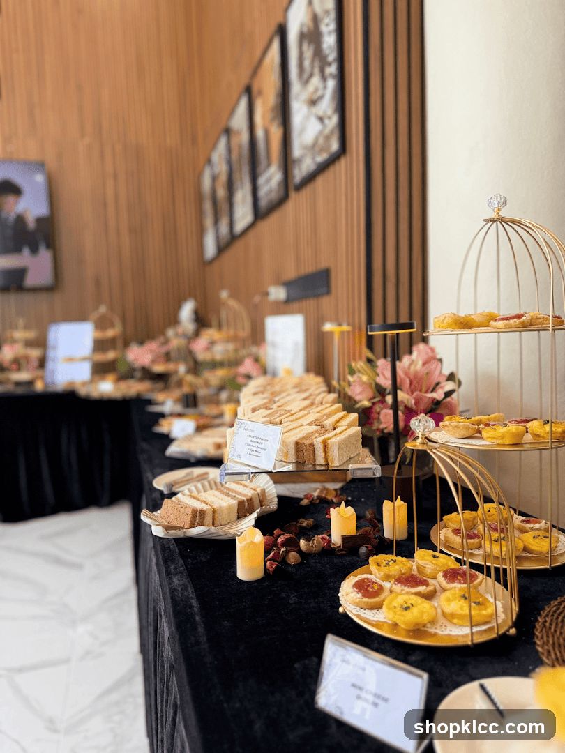 Buffet Table with Finger Foods and Pastries