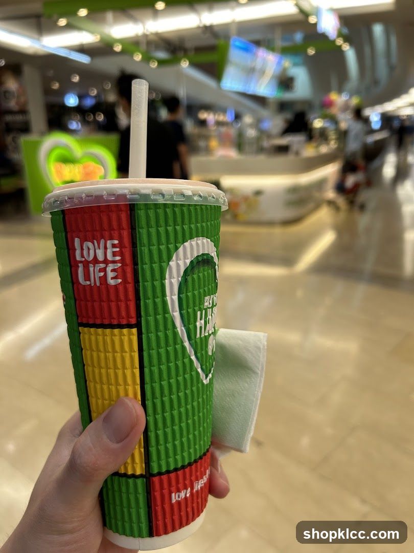 Cup with straw and napkin