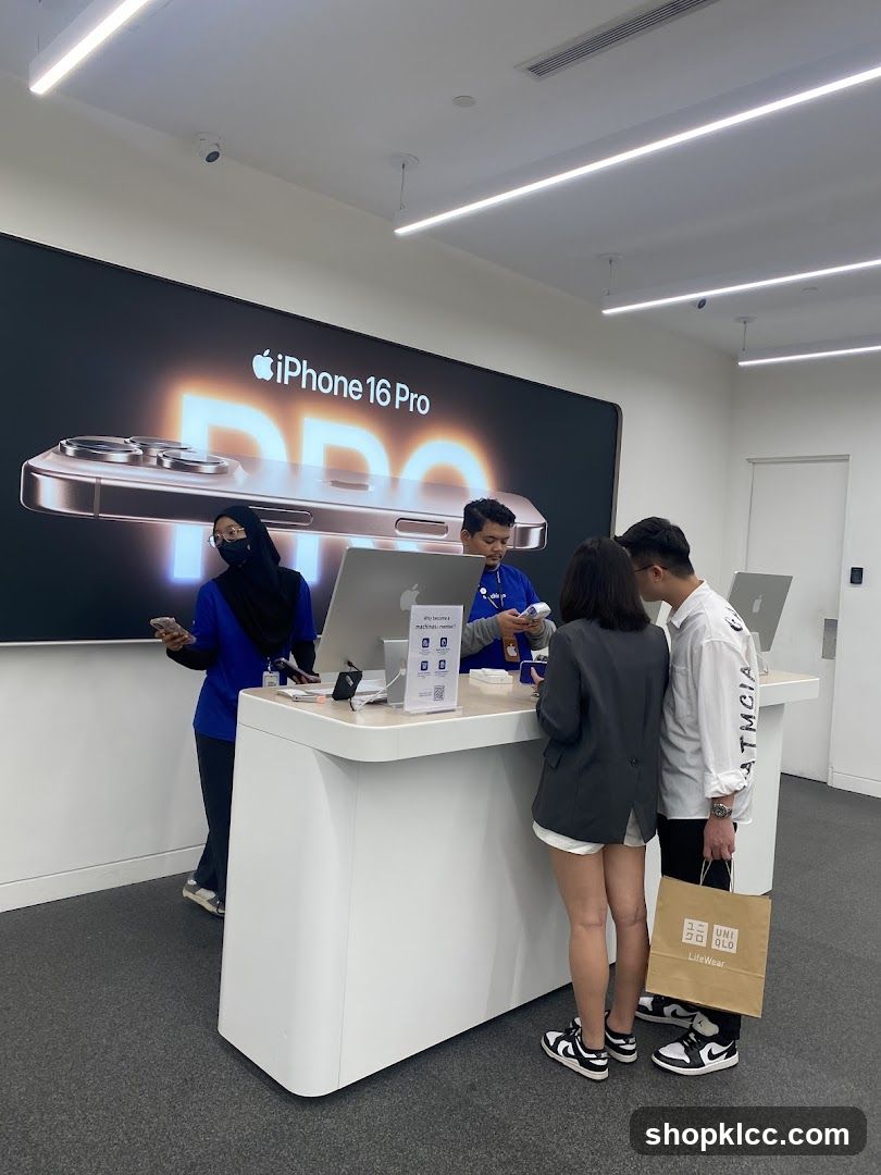 Customers interacting with staff at a retail counter