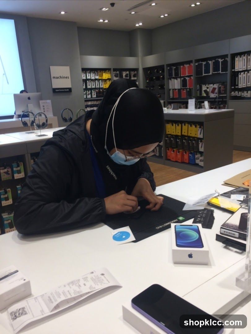 Store Employee Assisting Customer