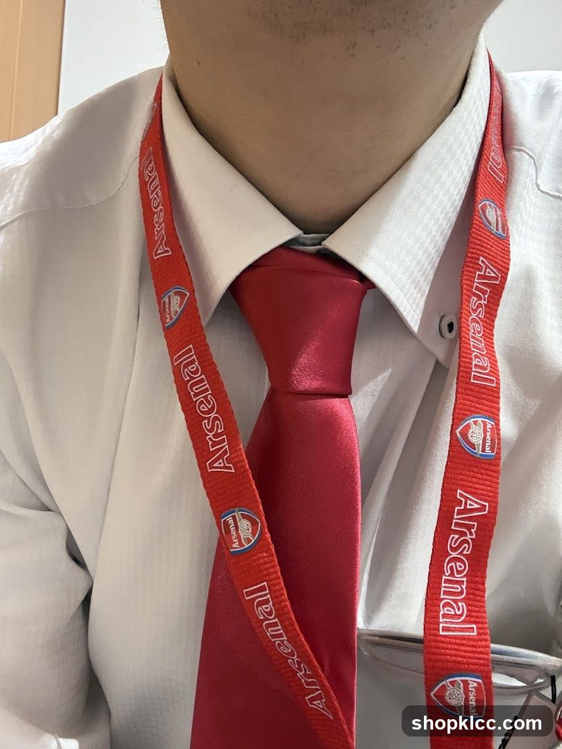 Person wearing Arsenal lanyard