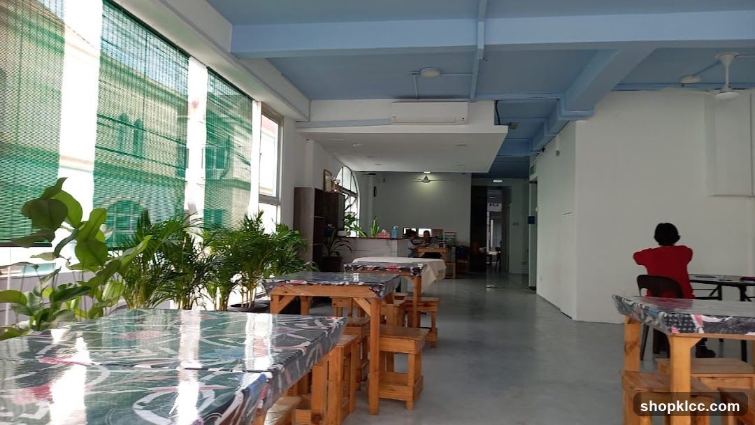 Indoor seating area with tables and chairs