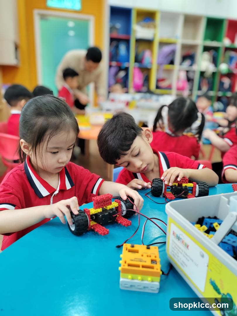 Children building robots