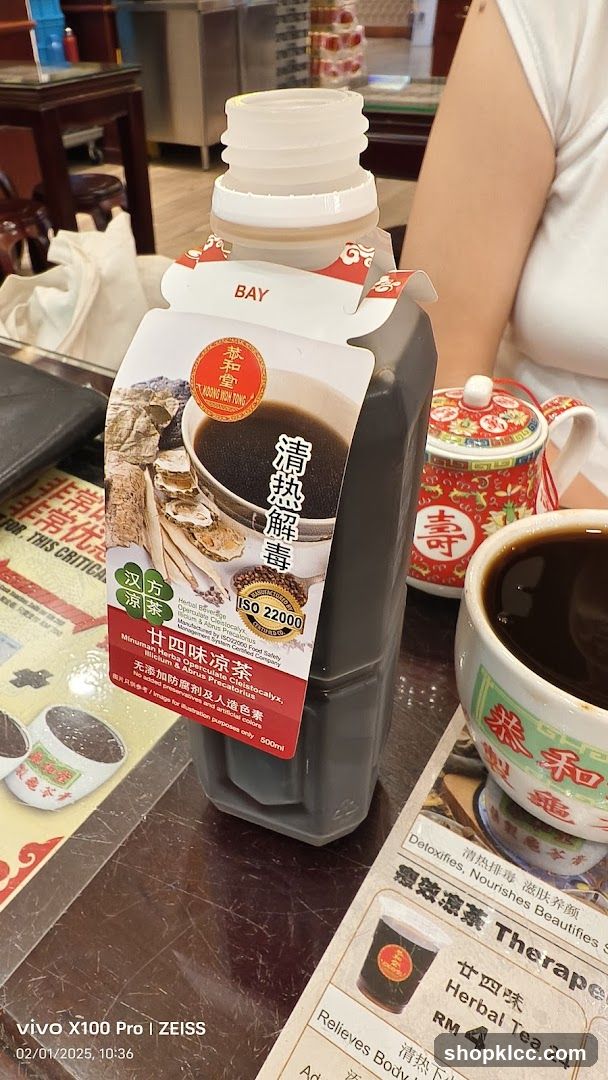 Herbal Tea Bottle and Menu