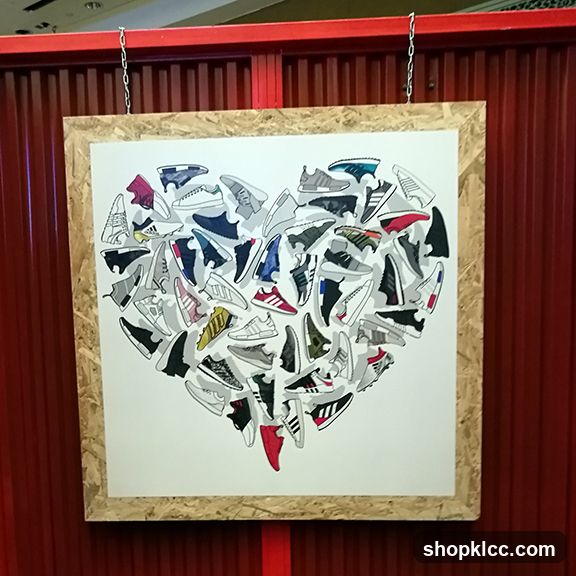 Heart-shaped collage of sneakers