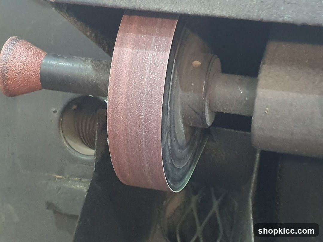 Close-up of a sanding belt on a machine