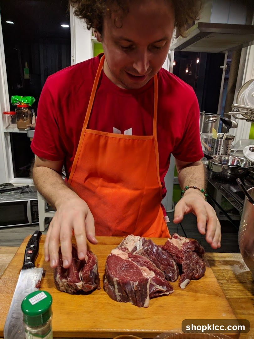 Man preparing raw meat
