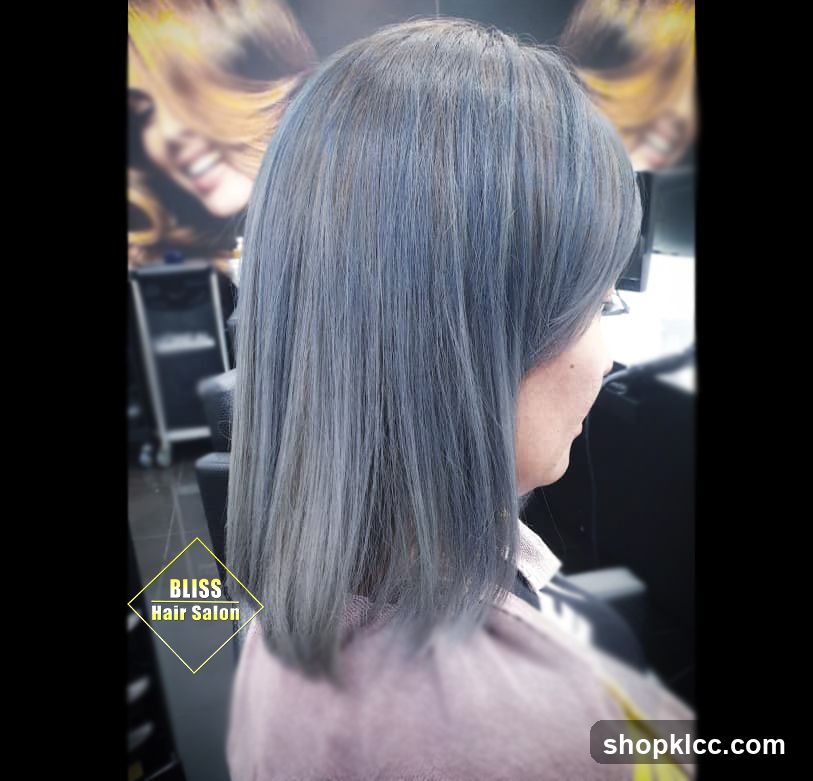 Woman with gray hair at salon
