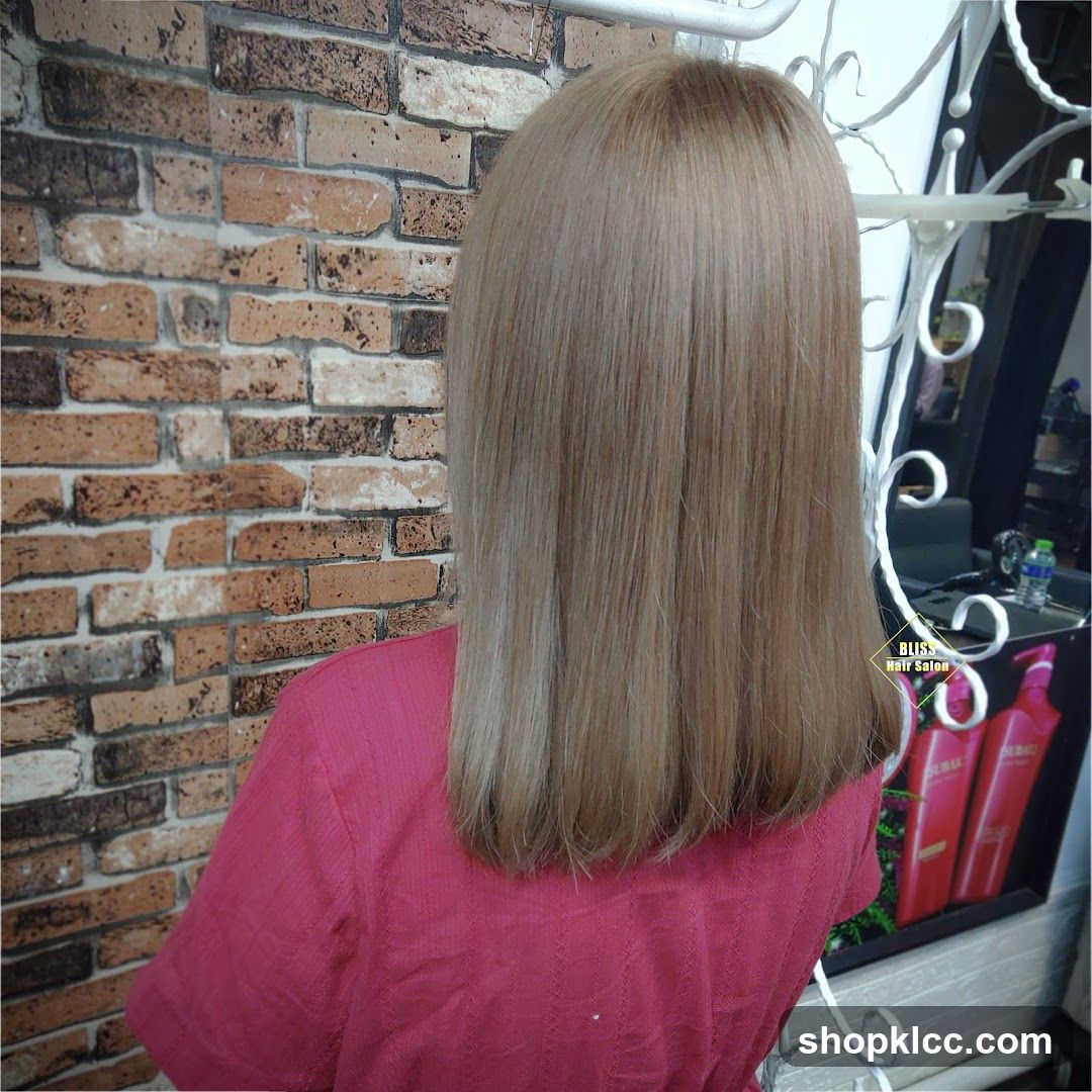 Woman with Blonde Hair in Salon