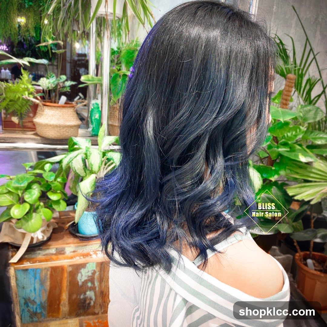Woman with Blue-Toned Hair in a Salon