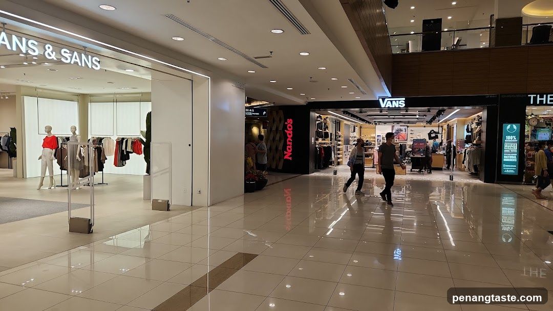 Shopping Mall Interior with Various Stores