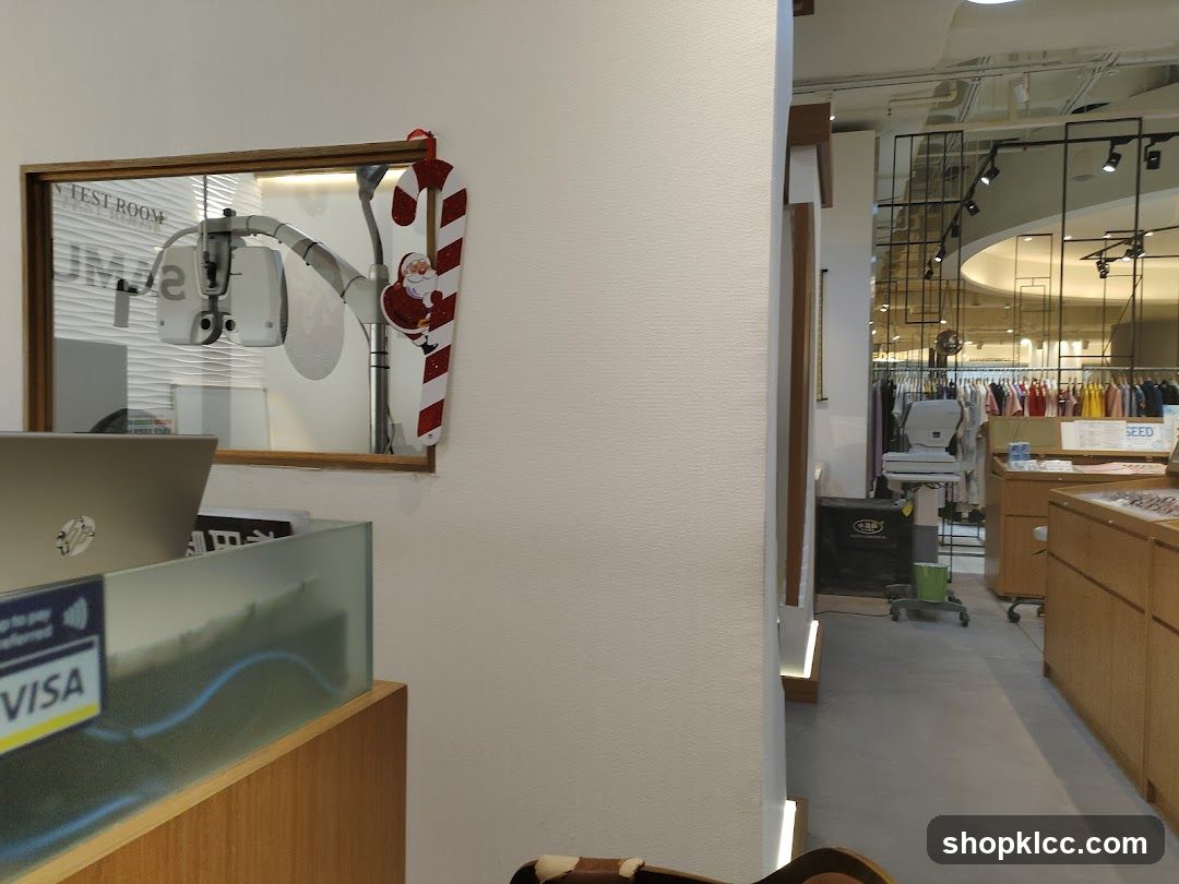 Interior of a retail store with optical equipment and clothing displays