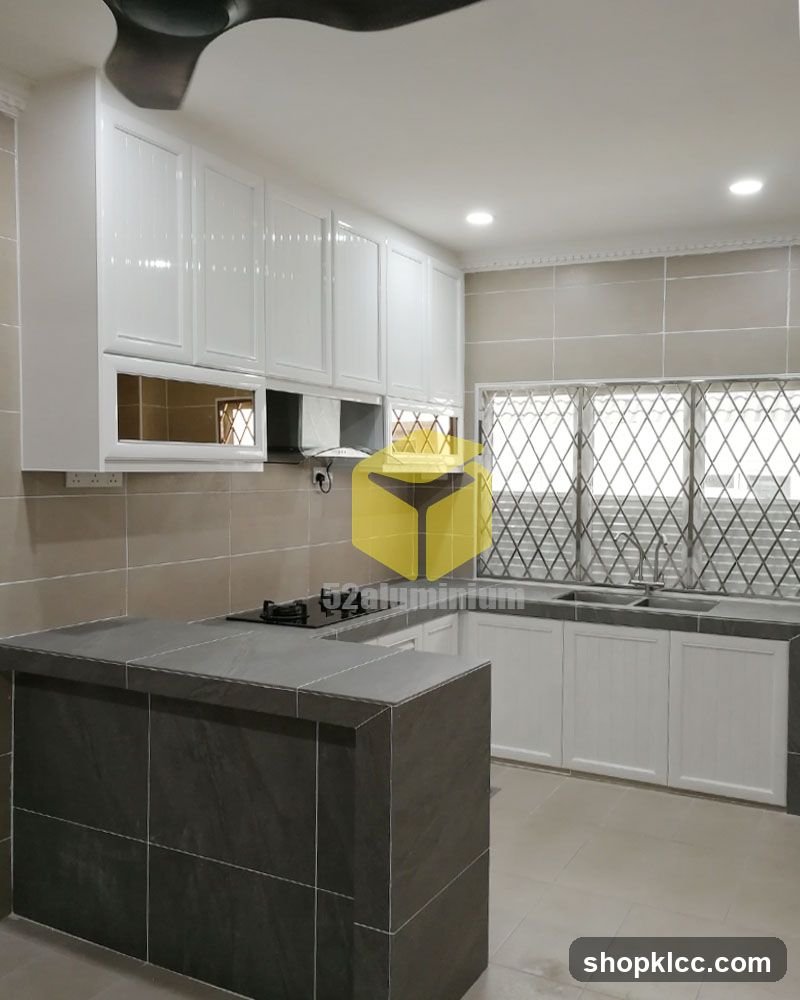Modern Kitchen with Island and White Cabinets