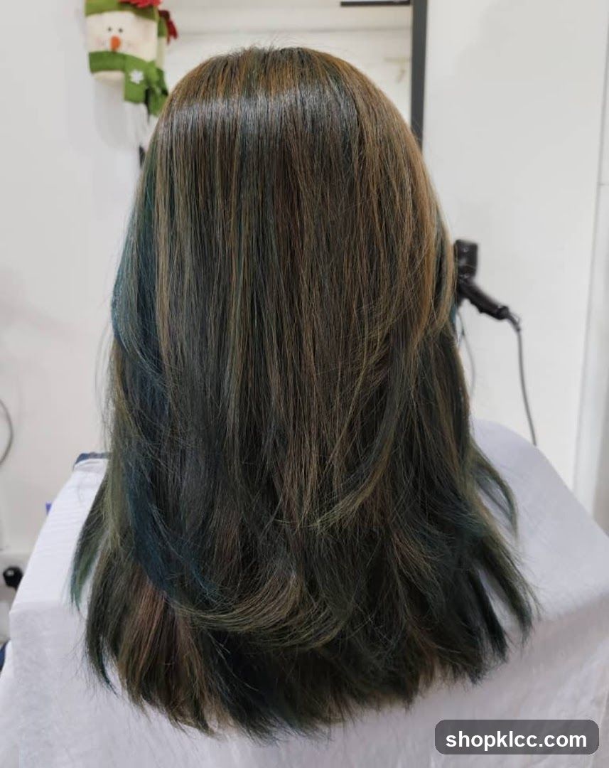 Woman's Hair with Teal Highlights