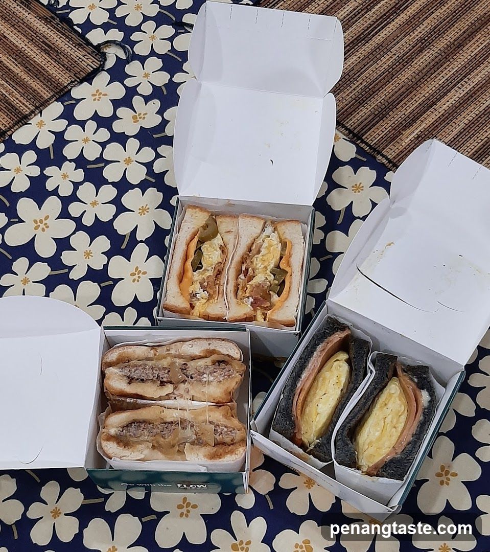 Three Boxes of Sandwiches