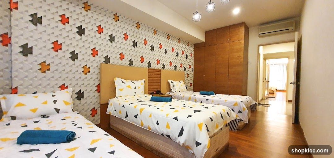 Bedroom with three beds