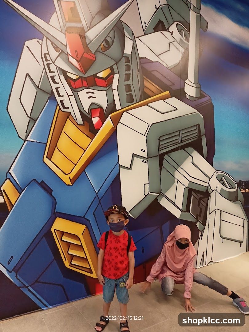 Children Posing in Front of Gundam Mural