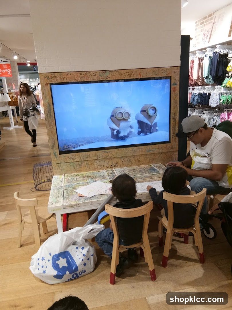 Children watching TV in a store