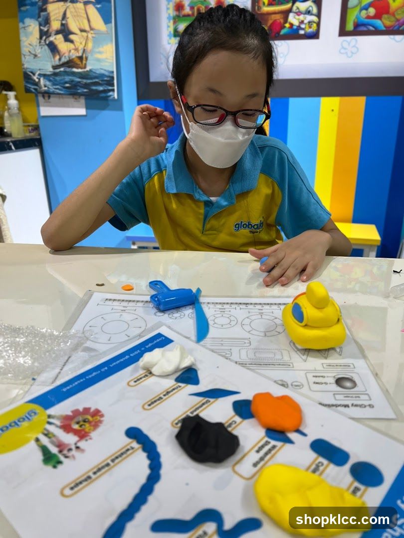 Child doing clay modeling