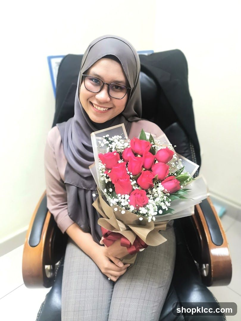 Woman holding a bouquet of roses