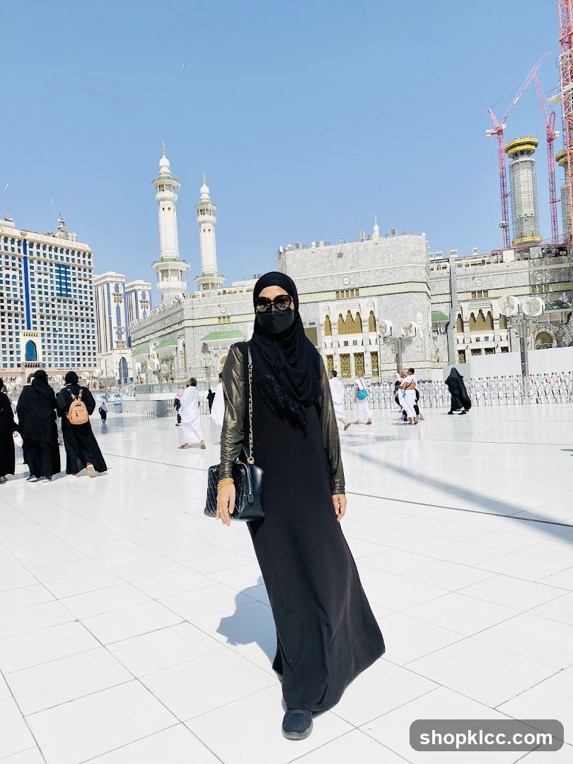 Woman in black abaya and hijab in Mecca