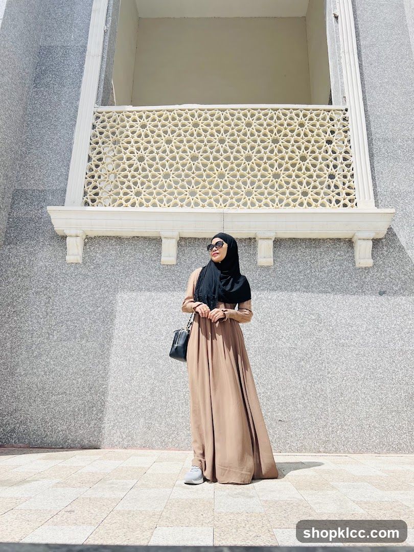 Woman in Hijab Posing in Front of a Building