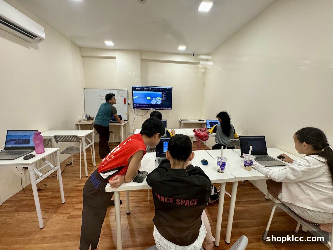 Children learning in a computer lab