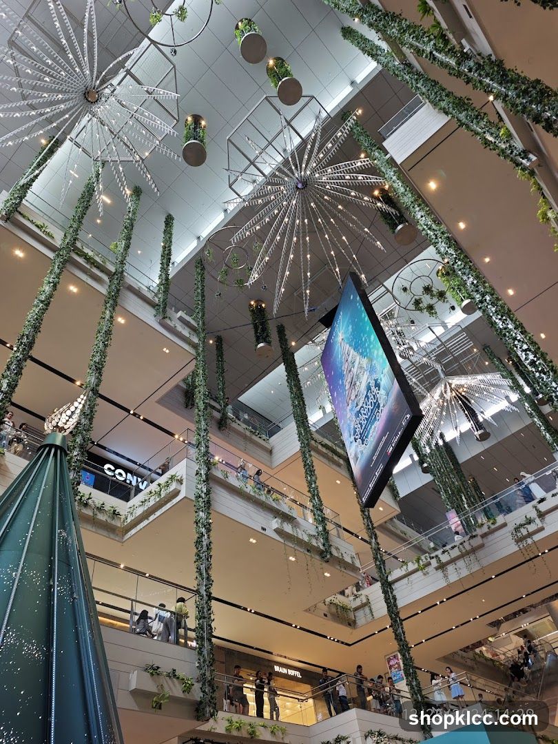 Interior of a multi-level shopping mall with festive decorations